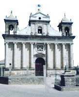 a church with a bell tower and a cross on the top