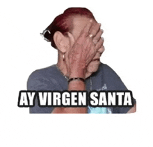 an elderly woman is covering her face with her hands and the words ay virgen santa are written above her .