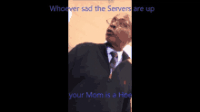 a man in a suit and tie says " whoever sad the servers are up "