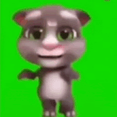 a cartoon cat is standing on a green screen and smiling .