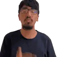 a man with glasses and a beard makes a funny face
