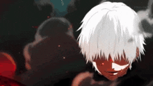 a close up of a person 's face with white hair and a red eye .
