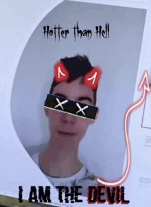 a picture of a man with devil horns on his head and the words i am the devil