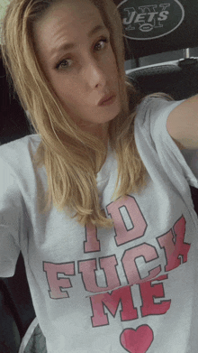 a woman is wearing a t-shirt that says i d fuck me