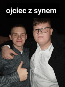 two boys are posing for a picture with the words ojciec z synem on the bottom