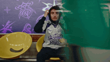 a man wearing a white jersey that says gentle paris
