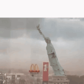 a poster for the american century of humiliation has a statue of liberty on it