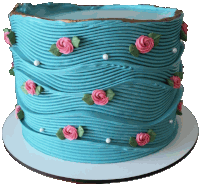 a blue cake with pink frosting and pearls