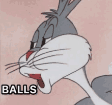 bugs bunny from looney tunes is looking at the camera with his mouth open and the words `` balls '' written below him .