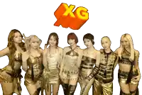 a group of girls are posing for a picture with a xg logo in the background