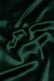 a close up of a green satin fabric