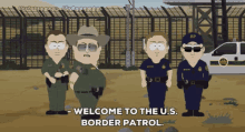 four border patrol officers stand in front of a fence with the words welcome to the u.s. border patrol below them