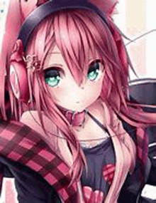 a girl with pink hair and green eyes is wearing headphones and a cat ear hat .