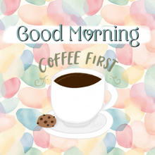 a cup of coffee with a cookie on a saucer and the words good morning coffee first