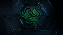 a green razer logo is on a dark background