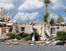 a building that has been destroyed by a storm