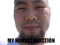 a close up of a man 's face with the words " my honest reaction " on the bottom