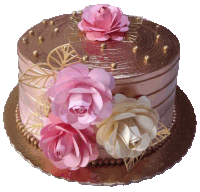 a cake with pink and white flowers on top