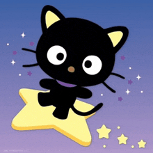 a black cat sitting on a yellow star