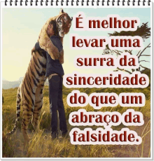 a man is hugging a tiger in a field with a quote in portuguese