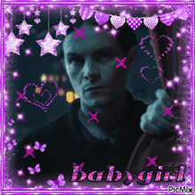 a picture of a man in a purple frame with the word babygirl on it