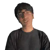 a man wearing glasses and a black shirt that says tobias on it