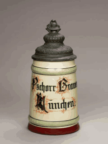 a ceramic container with a lid that says schorr baum munchen