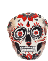 a day of the dead skull with red eyes and flowers