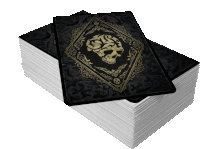 a stack of playing cards with a skull on the cover