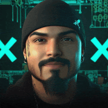 a man with a beard is wearing a black beanie with a blue x on it