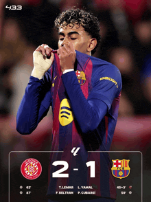 a poster for a soccer game with the score 2-1
