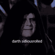 darth emperor from star wars is wearing a hooded robe and has the words `` darth sidiousrolled '' on his face .