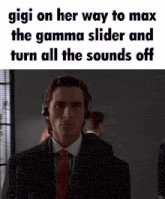 a man in a suit and tie is wearing headphones and a caption that says gigi on her way to max the gamma slider