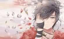 a boy with a bandage on his wrist is surrounded by roses and water bubbles .