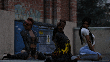 three women are kneeling down in front of a dumpster with a sign on it that says no smoking