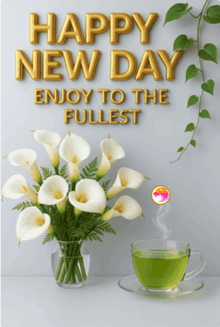 a bouquet of flowers sits next to a cup of green tea