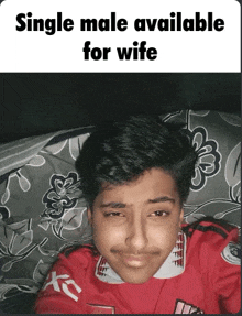 a young man is laying on a bed with the words single male available for wife on the bottom