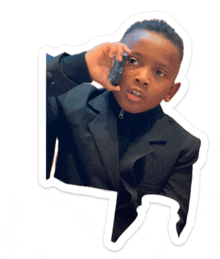 a sticker of a young boy in a suit holding a cell phone