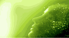 a silhouette of a person 's face is made of green particles