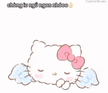 a hello kitty sleeping with wings and the words good night written above her