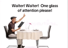 a waiter is sitting at a table with a menu in his hand