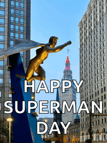 a statue of superman with the words happy superman day