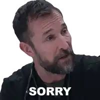 a man with a beard and a stethoscope around his neck is saying sorry