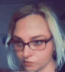 a close up of a woman wearing glasses with the word rage on the bottom right