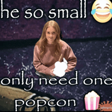 a girl is holding cotton candy in a meme that says he so small only need one popcon