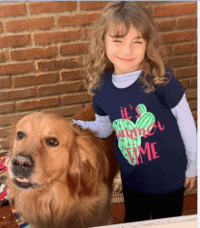 a little girl wearing a shirt that says it 's summer time is standing next to a dog