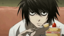death note l is eating a piece of cake with a fork .