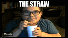 a man drinking through a straw with the words the straw written above him