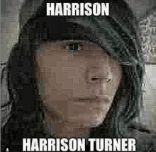 a mosaic of a woman 's face with the words `` harrison turner '' written on it .