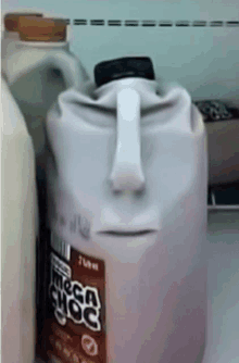 a gallon of milk shaped like a face